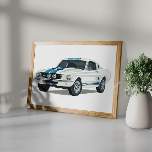 White Ford Mustang GT500 art print in a wooden frame beside a potted plant