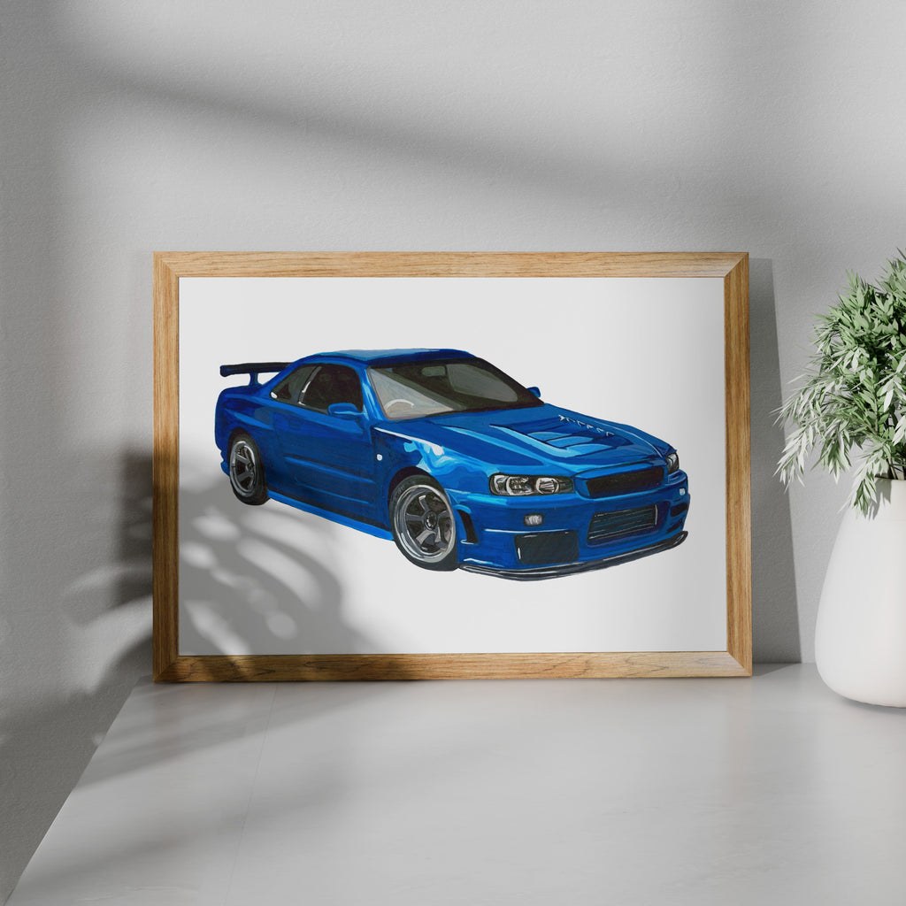 Framed blue Nissan Skyline GT-R R34 art print shown at an angle on a white surface