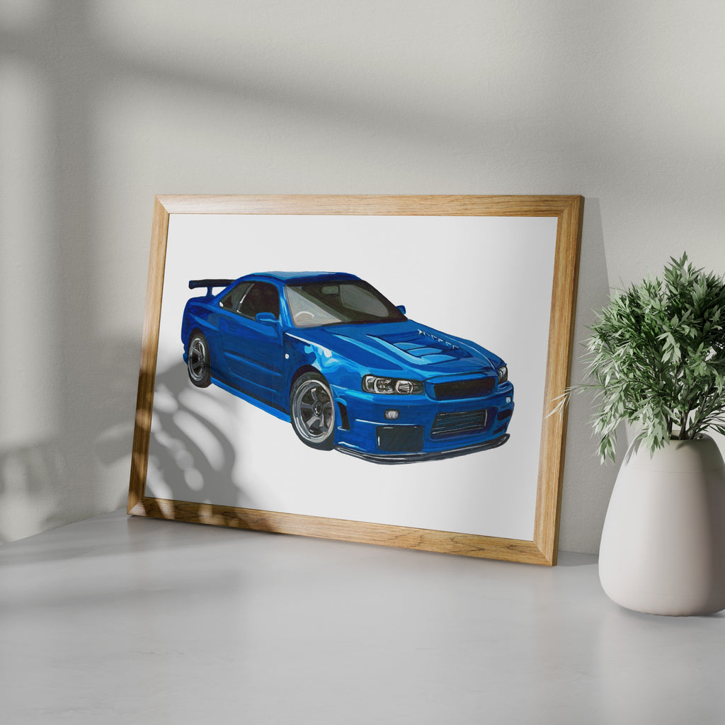 Blue Nissan Skyline GT-R R34 art print in a wooden frame beside a potted plant