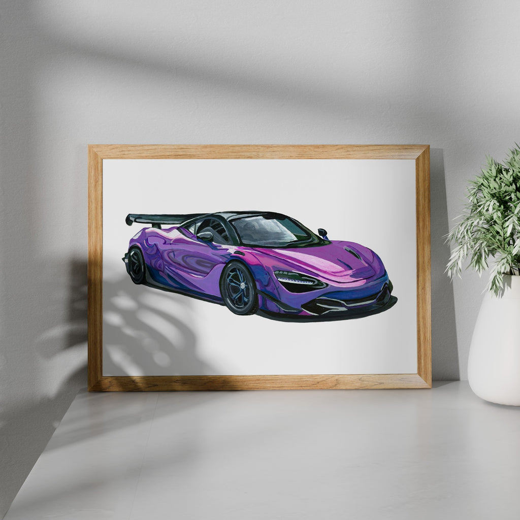 Purple supercar art print in a wooden frame beside a potted plant