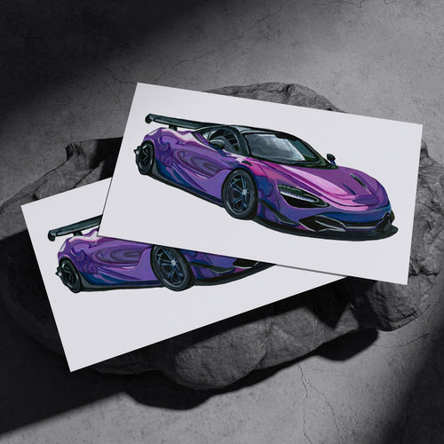 Two purple supercar art prints resting on a dark stone surface